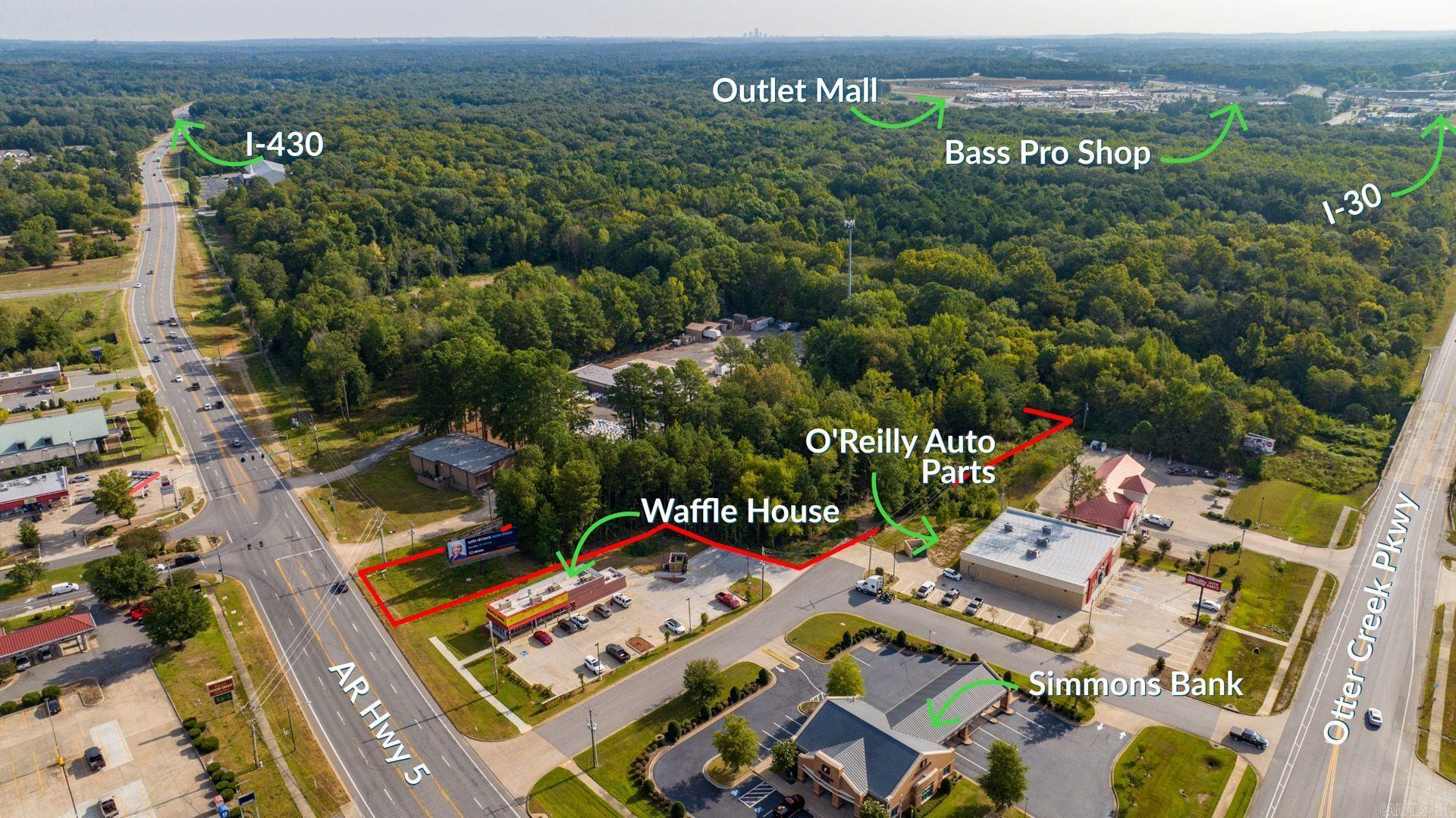 2.6 acres less than a minute to interstate 30! Great location directly on Highway 5 in busy high traffic area. This 2.6 acres is flat and ready for commercial development. Easy access to both Interstate 30 & Interstate 430. The last car count was done in 2022 with an average of over 19,000 vehicles per day.