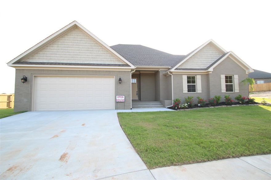 Very nice all brick home in Remington Place!   Minutes from schools, and shopping!  4 bedrooms, plus a game room.  Granite tops through out, 10 foot ceilings.  Large center island in kitchen.  Fireplace with builtins in great room  Crown molding, nice window trim    Large covered back porch