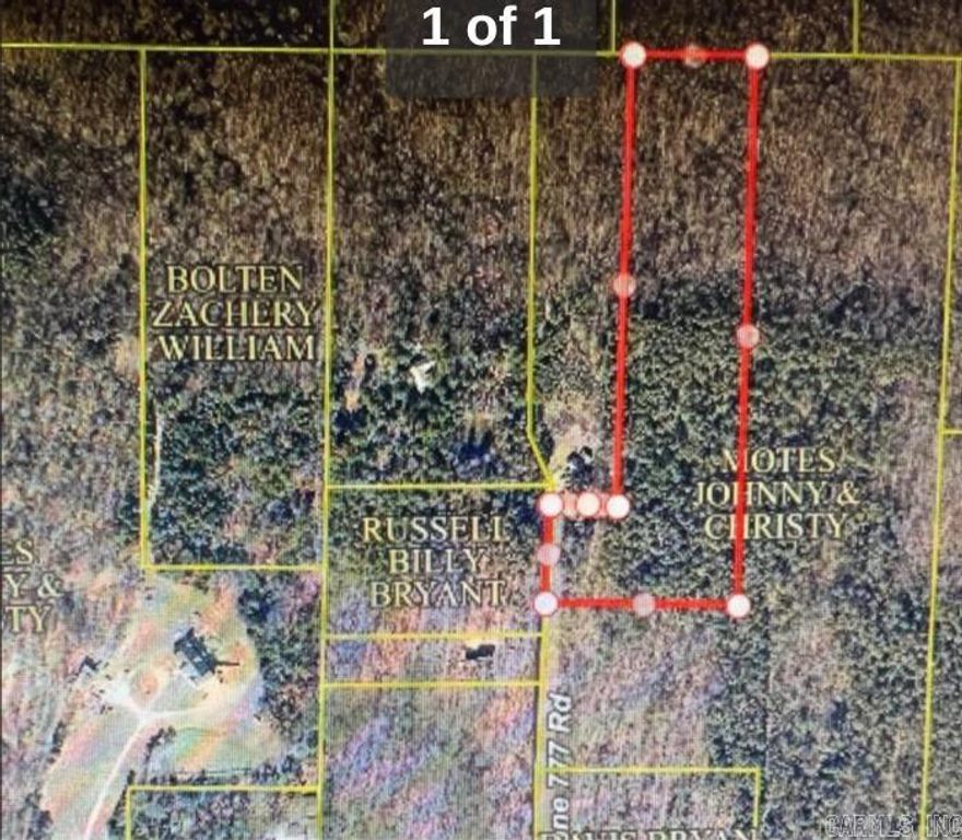 11 Wooded Acres with endless possibilities .. County road frontage that's great for hunting , or building your dream home.