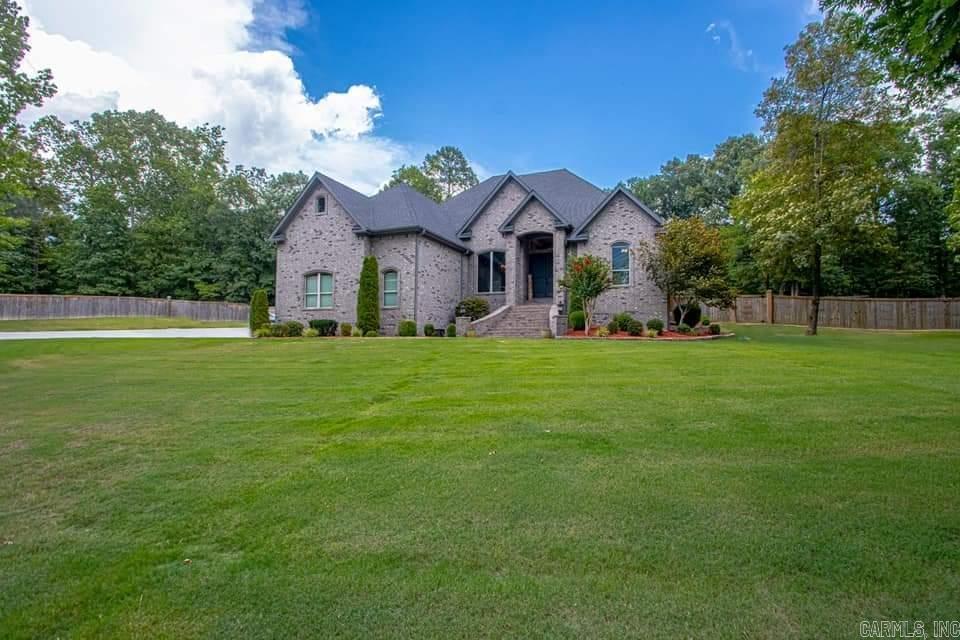 Your Dream Home Awaits! Welcome to this spacious 3,434 sq. ft. home on 3.02 acres designed for comfort, entertaining, and everyday living. This home includes a HUGE covered back porch; GIANT saltwater pool + stand-alone hot tub; additional attached garage on the back of the house; & full yard sprinkler system. Chef's side by side refrigerator, camera system, projector/screen all convey (generator is negotiable).