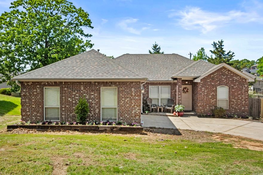 Discover this adorable and welcoming home nestled on a tranquil cul-de-sac, featuring a spacious open floor plan perfect for comfortable living and entertaining. The stylish kitchen boasts painted cabinets, a tile floor, a convenient breakfast bar, stainless steel appliances, a tile backsplash, and a generous pantry—ideal for culinary enthusiasts. The expansive living area is anchored by a cozy wood-burning fireplace with a gas starter and is enhanced by a stunning tray ceiling, creating an inviting atmosphere. The thoughtfully designed split-bedroom layout offers a large, luxurious master suite with double sinks, a relaxing jetted tub, a spacious shower, and his-and-hers closets. Both guest rooms are generously sized, with one featuring a vaulted ceiling for added charm. Step outside to the level lot with a lovely deck, perfect for outdoor gatherings and relaxation. This home truly has it all—must see to appreciate all the wonderful features!