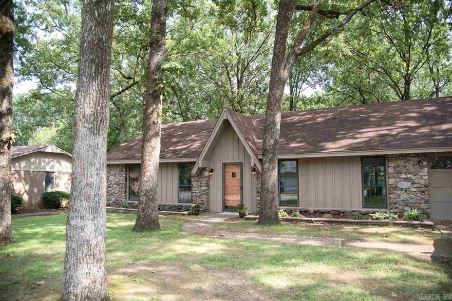 Beautifully remodeled 1 story home with character. Vaulted ceiling with real wood beams, stone fireplace, custom cabinetry in kitchen and baths with granite tops.  3 BR, 2 BA, good storage, office/craftroom & Bonus room upstairs.