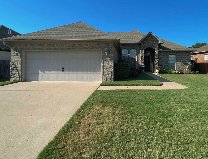 Stunning 3 bed 2 bath home in SW Conway! Be welcomed by 12' ceilings in the entryway leading into a large open living room with beautiful wood floors, gas fireplace, open concept for entertaining, breakfast room and breakfast bar, beautiful white cabinetry, granite counters and new appliances in the kitchen,fresh neutral gray paint throughout, newly updated lighting, formal dining room with soaring ceilings, master suite that's separate from the guest rooms for added privacy, HUGE walk in closet, jetted tub and gorgeous tiled walkin shower in the master bath. Opposite side of this home boasts two guestrooms and a full bath. Laundry room with additional storage, 2 car oversized garage with storage and workspace in the back, fully floored attic, privacy fenced back yard with a covered patio for lounging or entertaining guests, beautiful landscaping, new roof, and more! Zoned for Carolyn Lewis Elementary and Carl Stuart Middle School!