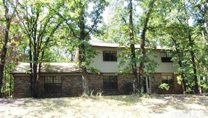 This 2 story with NEW ROOF in 2014 & NEW HEATPUMP 2011 offers 4 bedrms, 2.5 baths, formal living and dining plus den with wood burning firepl. is located on corner lot with side load garage and large fenced backyard.  This home is in need of updating but offers loads of space and is located in great WLR neighborhood.  The home has been priced to allow for updating with a sq.ft. price of $69.26 (neighborhood average $88.40 sq.ft.)