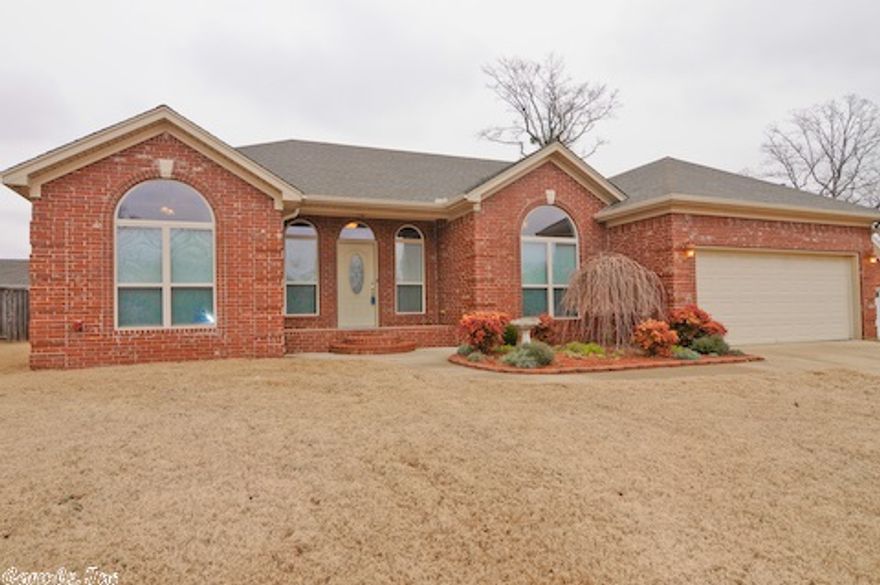 Custom built, all brick, 3 br 2 ba home in popular subd that borders the LRAFB. Home has tons of extras: formal dining room, glassed in sun porch thats heated and cooled w tile floor, lots of crown molding, oak cabinets, built in desk in kitchen perfect for the laptop, tile shower in master, decorative brick hearth, etc. Kitchen has an island, granite countertops, wall oven, lots of cabinetry. Wall mounted ironing board in laundry.There is an oversized patio, fertile garden spot and all fully fenced!