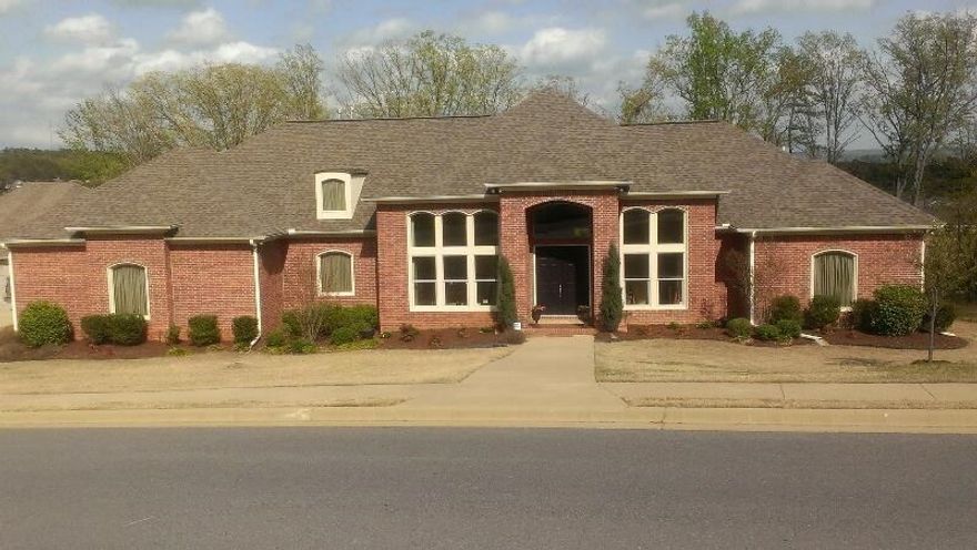 Priced below market value! One Level with separate dining room, beautiful hardwoods, office space, and custom drapes. Gourmet kitchen with fully equipped jenn-air stainless steel appliances and granite counter tops. Oversized backyard with covered deck. The home was rented for 3 weeks then vacant. Side loading 3 car garage. Oversized laundry room. Wrap around porch. Separate his and her bathrooms and bonus room.