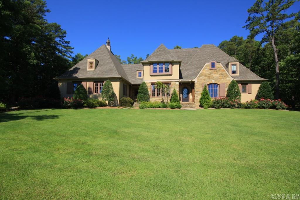Beautiful Southern French style home with access and partial view of the Chenal Golf Course. Enter into vaulted living room with cedar beams. Formal dining and office off of the front entrance. Gourmet open kitchen with Viking appliances and fabulous slab granite. Large master with custom his/her closets. Three bedrooms up with small tv area and large media room. Outdoor fireplace with view of golf course. Outdoor kitchen with slab granite. Oversized lot with access to golf course. 3 car. Come see!