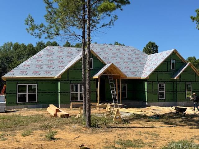 Beautiful new construction home in one of Greenbrier's newest subdivisions conveniently located off of Hwy 225. Enjoy high speed fiber internet here! Huge living room with an electric fireplace. You will fall in love with the large vaulted windows overlooking the private backyard. The kitchen is a dream with expansive countertops, plenty of cabinets and the amazing hidden pantry. The laundry room joins the primary closet which circles through to the primary bathroom. In the primary bath is a custom tile shower, soaking tub and dual vanities. Lockers located as you come in from the garage with lots of extra storage. Luxury vinyl flooring throughout with granite countertops in kitchen and bathrooms. 3 car garage Come see this home today! There are other homes under construction and for sale in this new phase of Coyote Ridge sub.