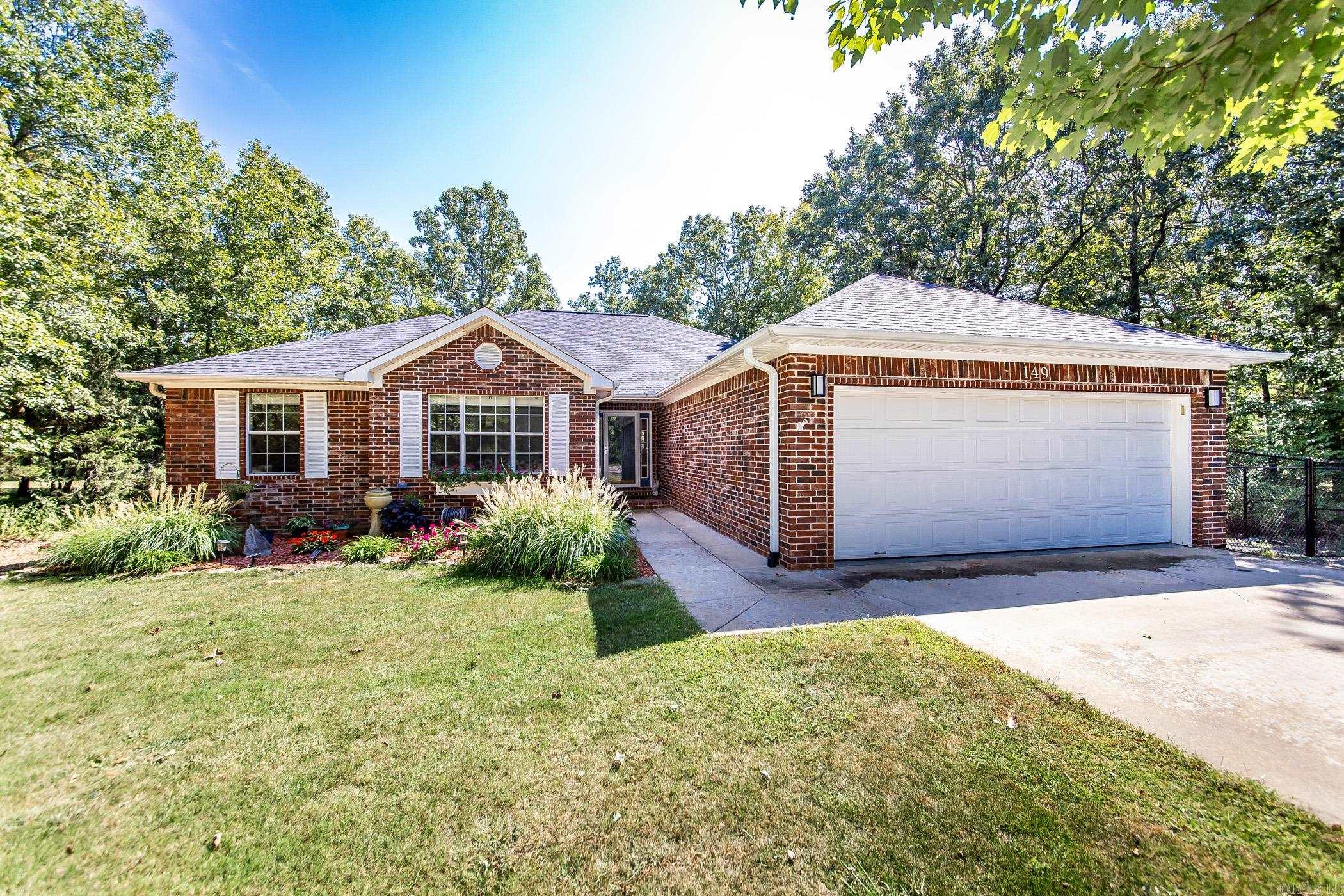 Nestled on scenic Indian Hills Golf Course, this exquisite single-story, NO STEPS, all brick home, offers the perfect blend of elegance, comfort, & modern living. The kitchen shines with granite countertops & attractive tile backsplash. Enjoy the warmth of the beautiful gas fireplace installed in 2021. The newly added covered deck is a great place to enjoy the beautiful scenery of Indian Hills Golf Course & enjoy your morning coffee or evening gatherings with family & friends, while the fenced backyard is perfect for privacy & pets. Other upgrades include: new roof in 2021, new a/c in 2022, new paint, garage door opener, storm door, toilets, & landscaping. Located just minutes from Greers Ferry Lake & Circle Acres Boat Launch, you will also have access to 3 swimming pools, hiking paths, ATV/UTV trails & new pickle ball courts & tennis courts. This meticulously maintained home is more than a retreat; it's a gateway to the vibrant & nature-rich lifestyle of Fairfield Bay. Dive into the outdoor adventures which includes 2-18 hole golf courses & a 40,000 acre lake, (one of the cleanest in the U.S.). This home is move-in ready where modern living awaits. Schedule your viewing today.