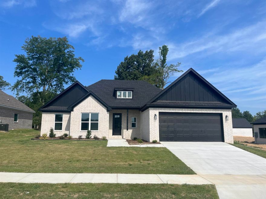 Beautiful New Construction home in a brand new subdivision. This home is a must see! Open kitchen with large island, cabinets to ceiling in kitchen, barn doors entering into the dining room, brick fireplace, wood beams, large walk in pantry, laundry room connects to the master closet, large primary suite with custom accent wall and wood beams, large primary walk in closet & bath. This home has so many custom features!