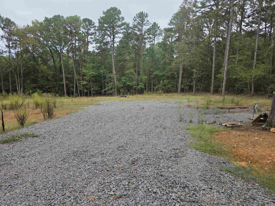 Double lot with a lot of trees removed. Nice, cleared area with a power pole, fiber optics. Water meter already installed. Recently perc. Ready to build on. Peaceful area. Fairfield Bay close by with two golf courses, swimming pools, 90 miles of ATV trails and a nice 40,000-acre Lake close bye.