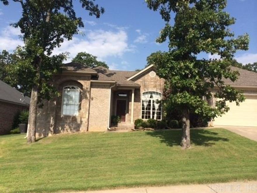 Beautiful 3 Bedroom/2.5 Bath Home w/Bonus Room   You MUST SEE to APPRECIATE...Stained Concrete, Upscale/Modern Light Fixtures, Stone Fireplace w/ TV Mount & Surround Sound, Stainless Appliances to include a Gas Cook-top & Side-by-Side Refrigerator, Laundry Room plus Pantry, 2-Car Garage & Additional Storage Room...On Demand Hot Water, Landscaping in the Front & Back Yard...Covered Patio,Storage Shed, & Wood Fence for Privacy!!!  Enjoy the Neighborhood sidewalks and the Lake!!!