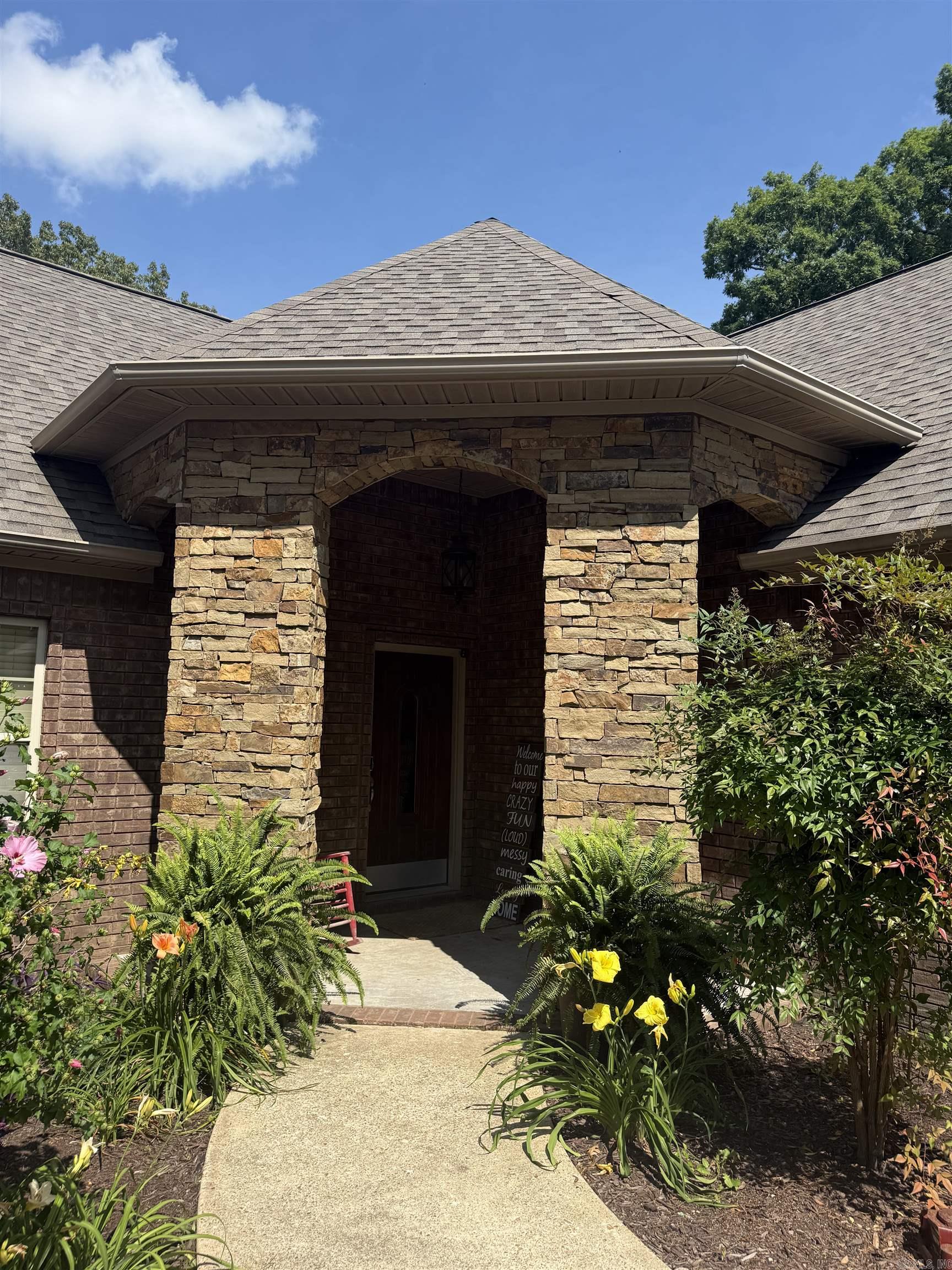 Discover this charming home located on Crowley's Ridge, yet only minutes from the conveniences of Wynne! This custom-built home offers 2,523 square feet on 4.76 acres. The home features stylish, functional space with an open floor plan. You'll also appreciate the recent updates, including a new roof, HVAC system, hot water heater, and granite countertops, all installed in 2023. The property also includes a 30x50 insulated shop built on a concrete foundation with gas heat, perfect for hobbies or extra storage. Additionally, there are 2 water wells on the property, one of which is fully functional. Don't miss the opportunity to own this move-in-ready, high-quality home!