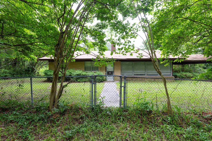 Prime Multiuse Commercial Property - 30.96 Acres! Unlock endless possibilities with this prime 30.96-acre commercial property, ideally positioned for maximum exposure and accessibility. Boasting extensive frontage along Interstate 530, this location seamlessly connects Little Rock to Pine Bluff. Additionally, it features strategic frontage along Arkansas Highway 104, linking US 270W to US 65N. This versatile property includes a charming brick house, a spacious barn, multiple outbuildings, lush pastures, and valuable forested areas. It offers the perfect blend of development potential and serene country living. This property is located near new industrial developments and is a short distance from White Hall schools and the Jefferson Regional Medical Center clinic. Enjoy the convenience of being centrally located: 30-minute drive to the Arkansas Capitol Center and Bill and Hillary Clinton National Airport, 20 minutes to Saracen Casino, and 10 minutes to the National Center for Toxicological Research and Pine Bluff Arsenal. Whether you're looking to invest in commercial development, agricultural ventures, or a tranquil residential retreat, this property provides unmatched potential.