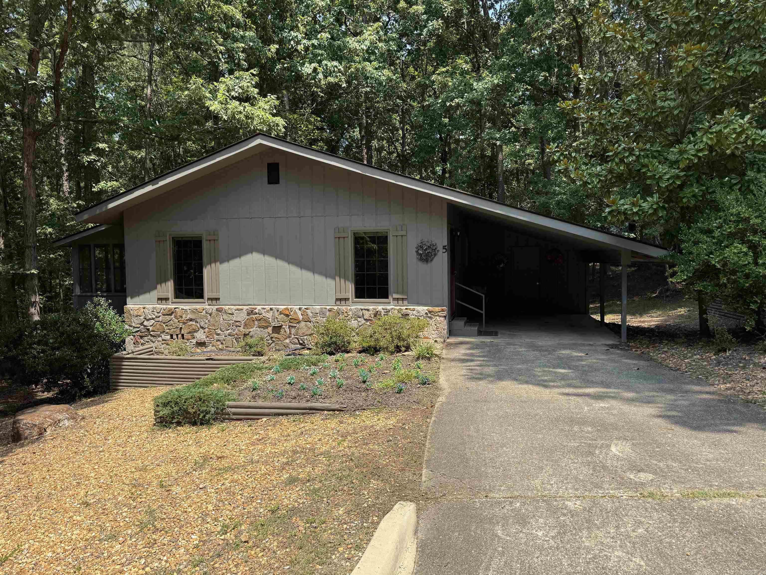 5 Cieza Lane is a beautifully updated two bedroom, two bath freestanding home located on a quiet cul-de-sac in Hot Springs Village. This home features hard surface floors throughout, a bright Arkansas room overlooking peaceful forest land, and comes equipped with a washer, dryer, and refrigerator for your convenience. Recent updates give it a modern, move-in ready feel. Hot Springs Village is the nationās largest gated community, offering 11 recreational lakes, 9 championship golf courses, scenic trails, and a welcoming lifestyle surrounded by the beauty of the Ouachita Mountains. No pets and no smoking are permitted. Renter pays electricity and water. One month deposit due at move-in. Credit/background check required and number of last residence.