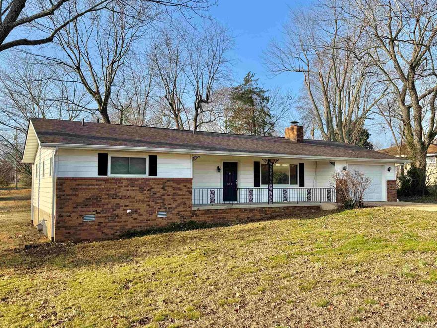 3 bedroom, 2 bath home conveniently located in town and just blocks from the hospital. New shingles in 2025.The home offers central heat and air, natural gas heat and hot water, and a cozy wood-burning fireplace for added comfort. Enjoy outdoor living on the large back deck, perfect for relaxing or entertaining, and the convenience of a one-car garage. Situated in a nice, established neighborhood close to shopping, dining, and everyday amenities—this home offers comfort, efficiency, and a great in-town location.