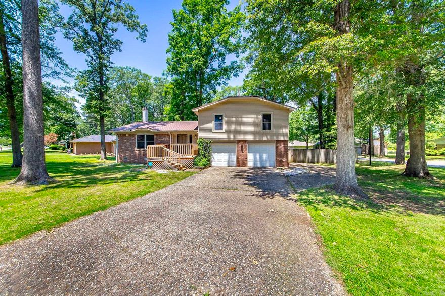 Welcome to your picture-perfect home sweet home! From the moment you pull into the driveway, this adorable home will steal your heart. A spacious two-car garage offers plenty of room for parking and storage, and the large front porch invites you to sit, relax and enjoy your morning coffee or a peaceful evening breeze. Step inside and you’re welcomed by a cozy living room featuring a beautiful wood burning fireplace nestled caddy-corner across the room - ideal for creating that warm and inviting atmosphere. Large windows let the natural light pour in, making the space feel bright and open. The living area flows effortlessly into the dining room and kitchen combination, perfect for entertaining or everyday living. The kitchen is both functional and stylish with black appliances, rich wood cabinets, a large pantry for all your storage needs and trendy open shelving that adds charm and personality. This home offers 3 bedrooms and 2 full bathrooms, providing the perfect amount of space for families, guests, or a home office setup. Step out back and discover the gem of this property-a huge fenced in backyard! With an oversized deck and still tons of room to entertain!