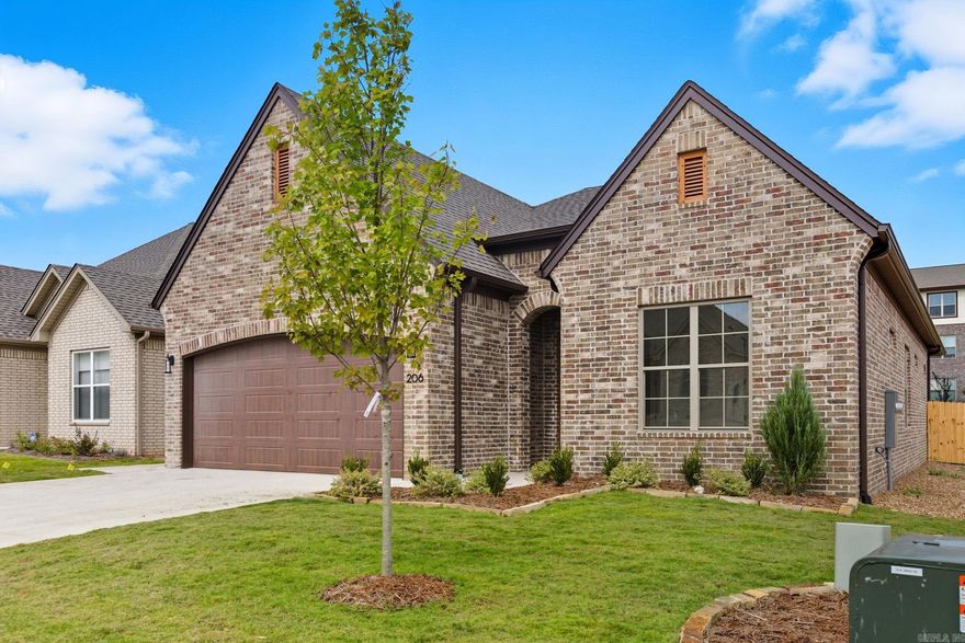 Welcome to Edgewood, the newest haven of luxury living in West Little Rock!  Nestled amidst lush landscapes and mature trees, Edgewood offers a tranquil retreat while keeping you close to your favorite shopping and dining spots. One of the many benefits of this sought-after neighborhood? Say goodbye to lawn care hassles—lawn maintenance is covered with your annual fees! Simply sit back, relax, and enjoy your beautiful new home.  This exquisite single-level residence features 3 bedrooms and 2 full bathrooms, designed with a functional and stylish layout. The primary suite is a true sanctuary, boasting a soaking tub, an oversized walk-in shower, and a custom closet that will exceed your dreams. The home showcases designer-curated finishes and unparalleled craftsmanship throughout. Perfect for entertaining, the open-concept design includes a chef's kitchen with quartz countertops, custom cabinetry, and much more.