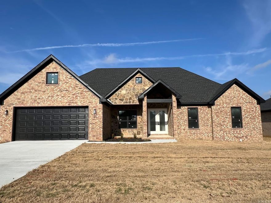 Discover this stunning new-construction home in Copper Moon Estates! This fully brick 4 bedroom, 2 bath home offers approx. 2,000 sq ft with tall ceilings, an open layout, and a desirable split floor plan. The inviting front porch features double entry doors and a beautiful tongue-and-groove ceiling. Inside, the fabulous kitchen boasts a center island with breakfast bar, pantry closet, under-cabinet lighting, and stainless steel appliances. The spacious primary suite includes an oversized soaking tub, separate walk-in shower, dual vanities, and a closet to impress. Enjoy outdoor living on the large covered back porch with tongue-and-groove ceiling and brick columns overlooking the oversized fenced backyard. Energy-efficient features throughout including foam insulated walls, ceilings, and duct work, and higher efficiency air conditioning. Located in a Rural Development eligible area. Don’t miss this beautiful property!