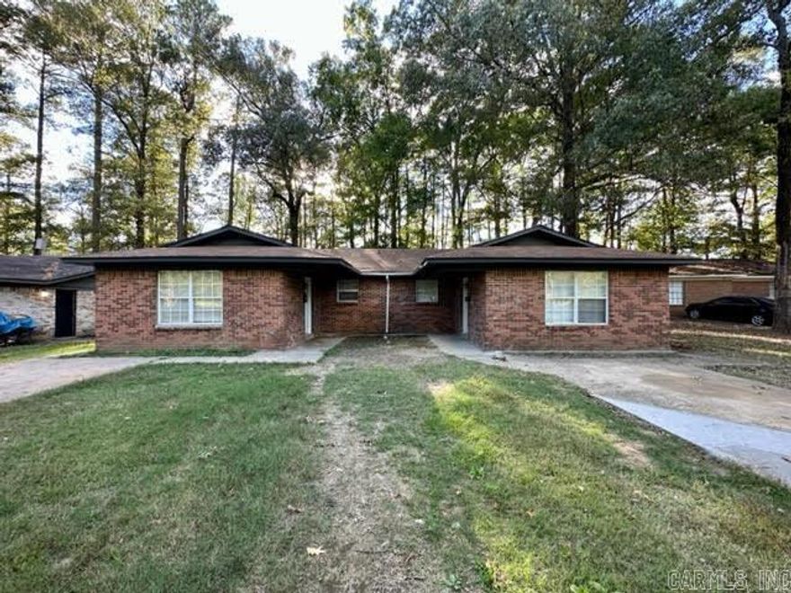 This property is a great investment opportunity. It is currently tenant occupied but the new owner could live in one side and rent out the other. Three bedrooms and one and a half bathrooms per unit. Close to I-30 and an easy drive to everything in Little Rock. Both units have a full sized laundry closet. There is a storage closet on the outside rear of each unit. Must have adequate notice to show this property. The units are mirror images of each other. The photos are of one side but represent both units. New roof and new attic insulation in 2024.