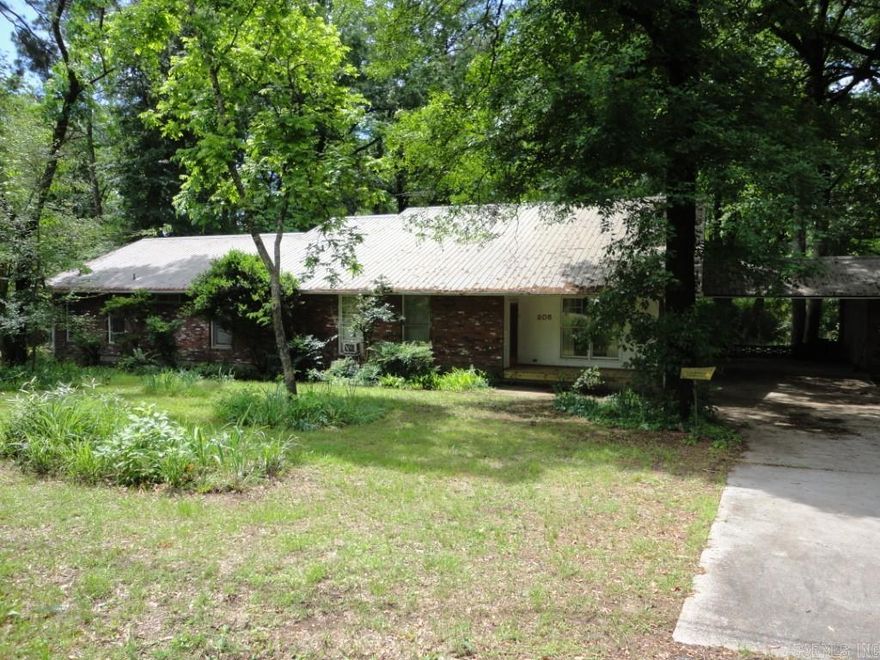 Just Listed: Custom-Built Retreat on 1+ Acre – Limitless Potential! For the first time, this original-owner masterpiece is available. Spanning over 4,000 sq. ft., this expansive home offers incredible flexibility with 6-bedroom potential. Plus, a lush acre-plus lot features a massive separate shop—perfect for hobbies or gear. The heart of the home is an oversized eat-in kitchen featuring a cozy wood-burning fireplace, complemented by a formal dining room. The thoughtful layout includes four main-level bedrooms, while the upstairs offers two versatile spaces perfect for additional bedrooms or a massive bonus room. Work from home in the dedicated office/craft space and enjoy abundant storage, including deep closets and a walk-out attic. (Note: seller is also offering additional lots for sale separately at the rear of the property/ square footage, year built, & acerage based on tax record information)