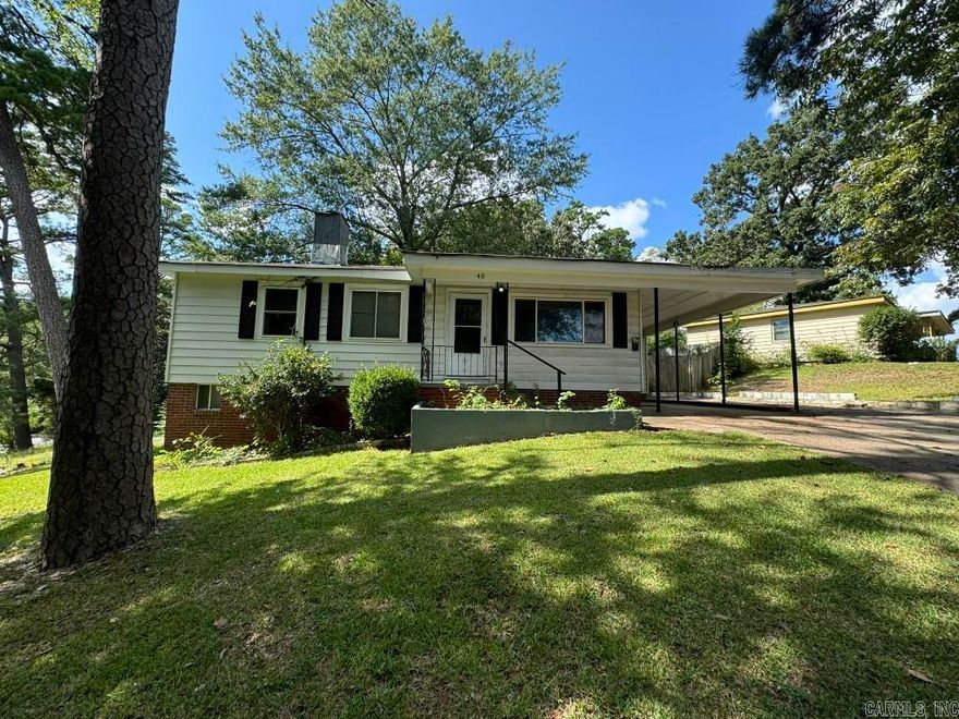Nice sized home in the heart of Little Rock. It features two living areas, a cozy fireplace, built in cabinetry, a bonus room that could be used as an bedroom/office, carport parking all on a corner lot. **Agents see confidential agent remarks for additional information and showing instructions.**