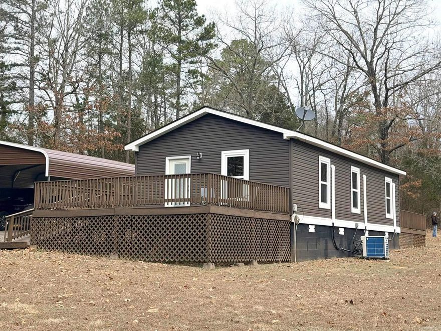 This charming cottage-style home rests on 3 picturesque acres, just minutes from Greers Ferry Lake and conveniently close to Clinton. This home has been completely remodeled, with new electrical wiring, conduit, mini splits, house leveling, fresh paint, paneling, an updated bathroom, plus a 25x26 carport and a 12x20 storage shed, just to name a few. It’s move-in ready and perfect as a starter home or for income potential as an Airbnb with Greers Ferry Lake just up the road! The 3-acre lot is well-maintained and level, with a clearing in the back that’s perfect for building another home, if desired. The two roomy decks provide an additional 480 square feet of outdoor living, offering a perfect blend of comfort and the beauty of nature. Call us today to schedule your showing.