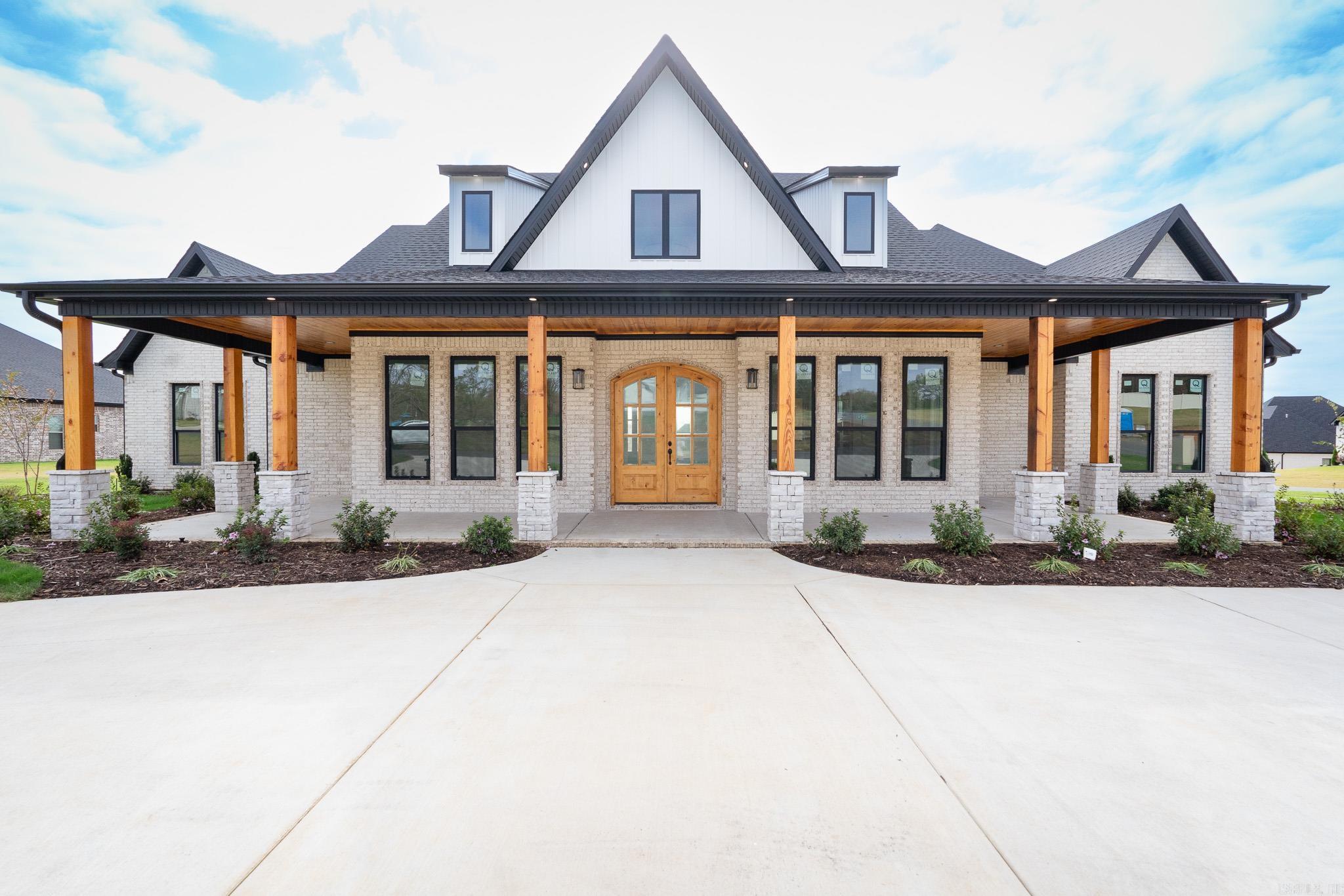 Welcome to an exceptional Highland Hills Subdivision residence, a benchmark in luxury living. This immaculate 5-bed, 4 1/2 bath new construction home is a testament to meticulous craftsmanship. Step inside, and the 20- foot ceiling in foyer then opening up 14-foot ceilings greet you with grandeur, creating an immediate sense of elegance. The gourmet kitchen boasts custom-built cabinets, granite countertops, and a gourmet gas 36" cooktop with a pot filler, catering to culinary enthusiasts. Safety is assured with a FEMA-approved saferoom, and outdoor entertaining is easy with an oversized outdoor porch, that includes outdoor fireplace, and outdoor kitchen privacy fencing, gutters, sprinklers and landscaping. Custom lighting, window blinds, and exquisite trim work add to the luxury. Energy efficiency is paramount, with low-e windows, cellulose insulation, and 18 Seer HVAC with 2 speeds for year-round comfort. The fully insulated three-car garage is both spacious and energy-efficient. Crafted with passion by a renowned VA builder, this home embodies modern luxury living. It's a statement of sophistication and quality that sets a new standard for custom-built homes.