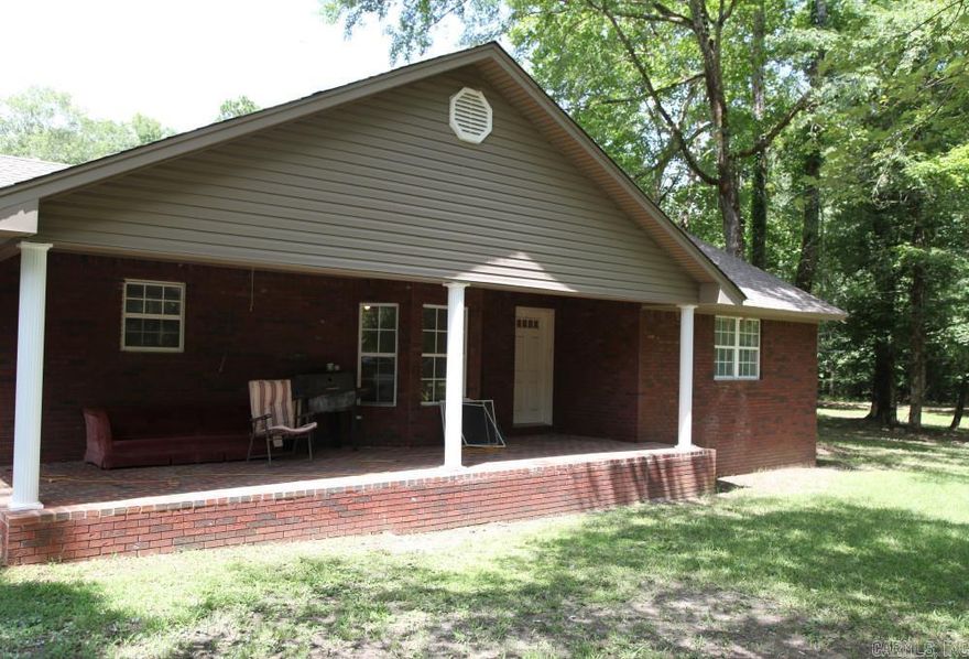 Looking for a home in the country to enjoy the peace and quiet? Then look no further. This recently remodeled 4-bdrm home, just south of Sheridan, is nestled on 8 wooded acres. Sip your morning coffee as you sit on the front porch enjoying the beautiful view of the pond and picturesque land. Soak up nature as you watch the deer and turkey. This stunning residence boasts 3 spacious bedrooms and 2 full baths with a 4th bedroom with half bath being just off the garage. This extra bedroom could be used as an office . As you step inside, you will be greeted by a beautiful open concept living and kitchen area, perfect for entertaining. The kitchen features a large island and brand new appliances, ensuring a modern and functional space for your culinary adventures. The spacious living area invites you to relax, complete with a cozy wood burning stove that adds warmth and charm. Enjoy the beautiful view with floor to ceiling windows that bring the outdoors in. Enjoy the large deck perfect for grilling and entertaining. Retreat to the spacious master suite with vaulted ceiling complete with adjoining master bathroom with large closet.