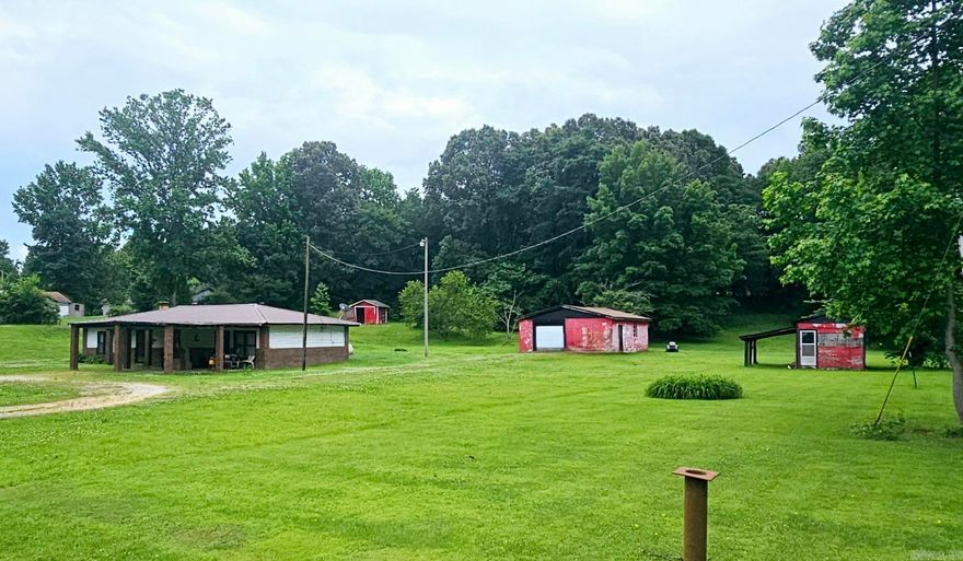Looking for country living with the convenience of town only minutes away?  This is it!  Check out this 2 Bedroom 1 bath house nestled on just under 2 acres.  This unique property features mature trees, 2 storage sheds, 1 shop & lots of room for a garden, pond or pool!  Call today to set up your personal tour of this quaint home & acreage.  This property is being sold as is allowing the new owner to update the house to fit their needs.