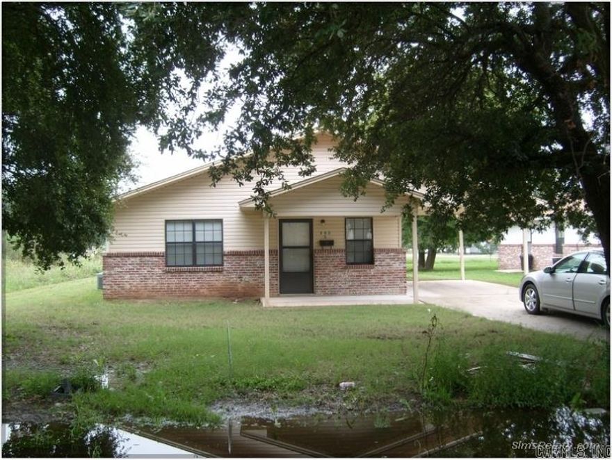 This 3 bedroom, 2 bathroom house is in good condition, with new flooring and a new metal roof in September of 2022. It is brick half way up and siding on the top half. It has central heat and air. There is a concrete driveway and single carport. I think it was built in 1990â€™s or 2000 and has been updated recently.