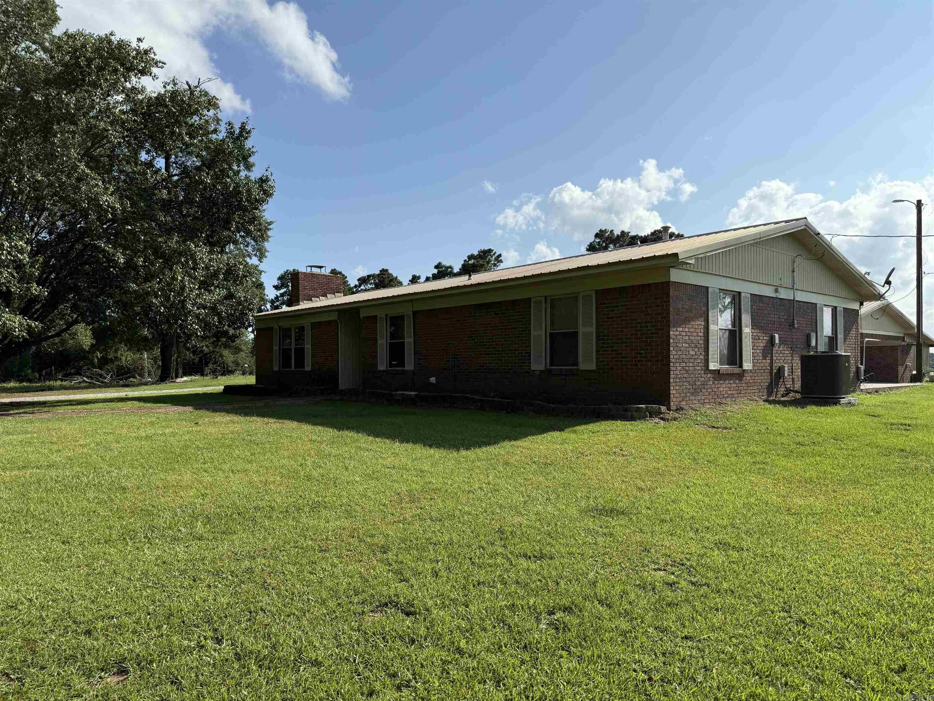 Property offers a brick home with approx 1,650 sq ft of living space, 3 bedrooms and 2 baths. Home has been updated throughout with new paint, new floor coverings and updated bathrooms. Newer CH/CA unit, on demand hot water and pellet stove. Poultry operation in Hempstead County offers 10 house broiler farm on approx. 46 acres. Current Tyson Contract, two generators, three wells, emergency rural water available, extra cool cells, poultry houses were totally updated in 2019. Some equipment and supplies will convey to new owner, including a tractor and two farm trucks. Contact our office for more details.
