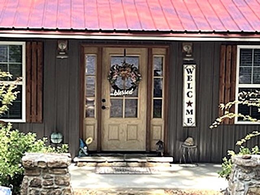 This charming 3 bed, 2 bath ranch-style home, built in 2020, offers 2,000 sq. ft. of modern comfort on over 7 picturesque acres, just minutes from the heart of Mountain View, AR. Featuring an open kitchen/dining area with a breakfast bar, cozy gas log fireplace, and luxury vinyl and tile flooring throughout, this single-level home is perfect for both relaxation and entertaining.  Step outside to your large deck, ideal for summer gatherings, or take a refreshing dip in your private above-ground pool. The property also includes a 24x36 ft. carport, garage, and beautiful sloped acreage with partial fencing, providing stunning views of the Ozarks. Parking is a breeze with space for four or more vehicles, with a 24x36 Garage, 2 Car Carport and RV Parking Pad.   Located close to Sylamore Creek, Blanchard Springs, and the White River, this home offers easy access to some of the best outdoor recreation in the area. Whether you're looking for a peaceful retreat or a place to host family and friends, this move-in-ready home is the perfect Ozarks escape.  Don’t miss out—call today for a showing!