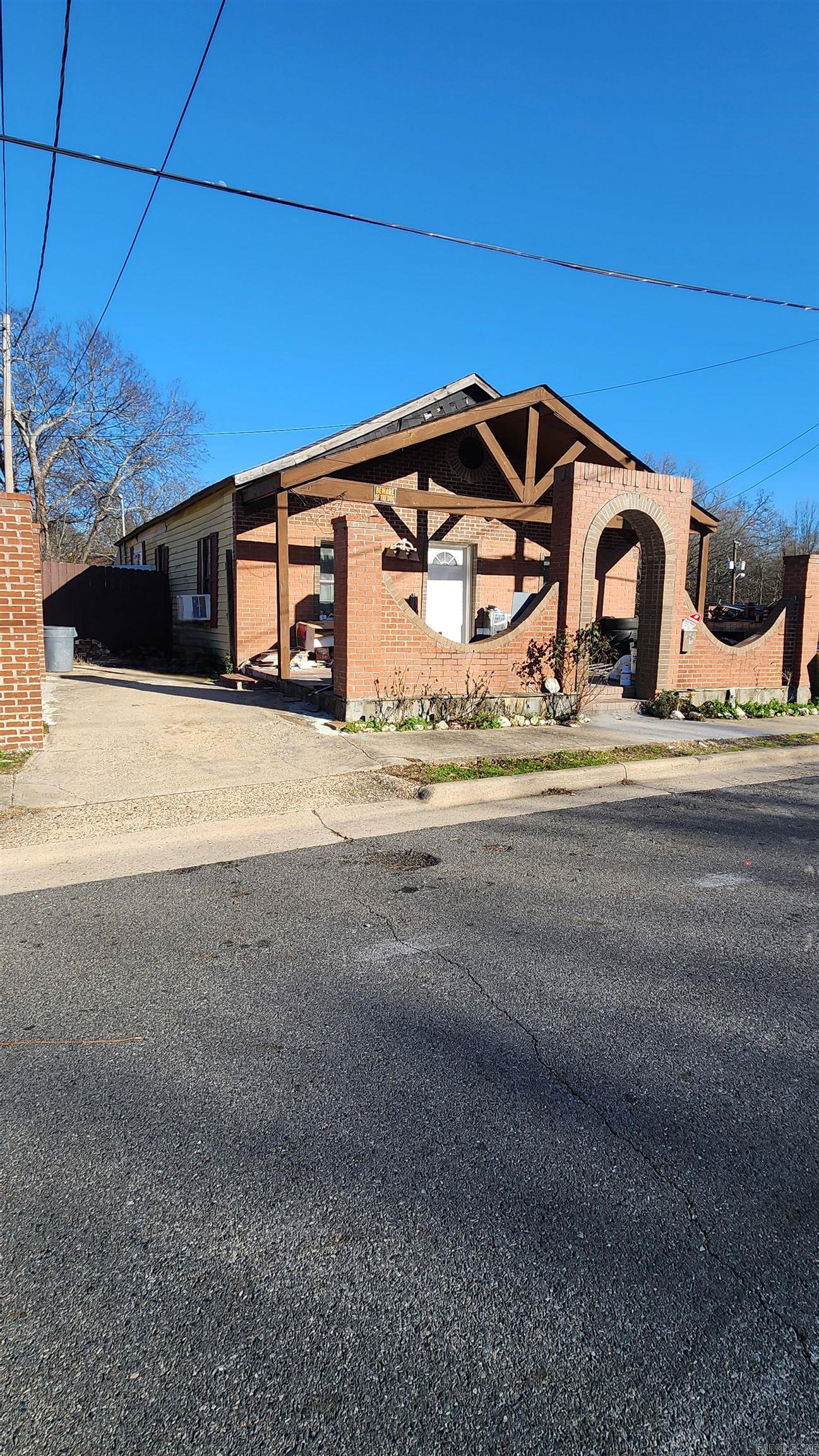 Property is in comercial lot as well! Charm house in excellent location! beautiful tile floors throughout the house, nicely updated bathroom. Roof is less than 3 years old. There's an extra room on the back. All plumbing is new all the way to the road. Stop by and see the potential! agents see remarks for showing instructions.