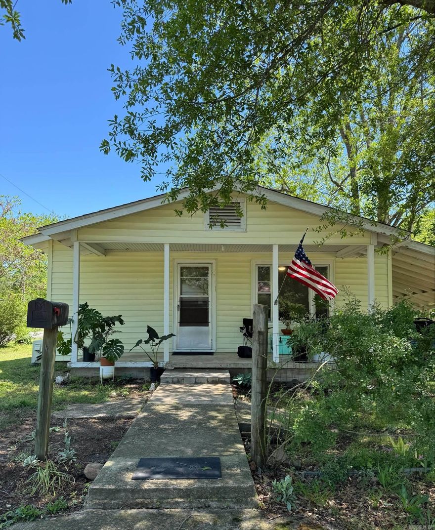 Recently updated home on a double corner lot near downtown Mena! Upgrades include new flooring, brand new mini split, countertops, light fixtures, new tile backsplash in both the kitchen and bathroom, fresh paint and lots of natural lighting! Home has a LARGE sunroom! Large yard with plenty of room to garden with an old barn, greenhouse and storage shed. Two very large old pecan trees to enjoy. A nice home that is move-in ready with lots of potential! Don't miss this opportunity!