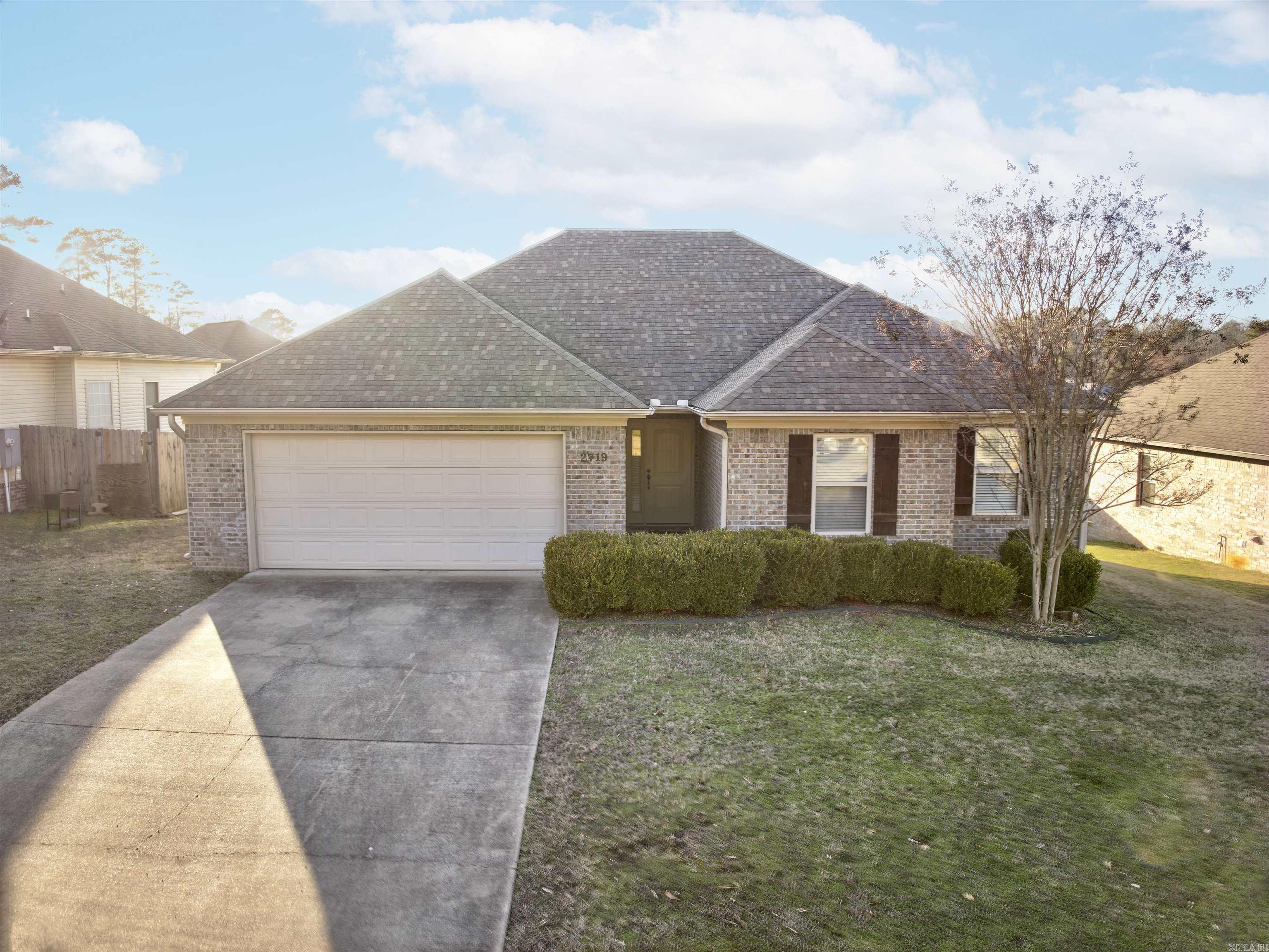Stylish Schrader-Built Home in Established Bryant Neighborhood – 3 Bed, 2 Bath Welcome to 2719 Finley Loop, Bryant, AR 72022 – a beautifully maintained 3-bedroom, 2-bath Schrader-built home that offers the feel of new construction with thoughtful custom touches throughout. Step inside to find beautiful well maintained countertops, sleek stained concrete floors, and trimmed out gas log fireplace that sets this home apart. The open-concept layout provides a comfortable flow, perfect for everyday living and entertaining. Located in a well-established subdivision with a community playground, this home offers the perfect mix of charm, quality, and convenience. Don’t miss your chance to own a move-in-ready gem in the heart of Bryant – schedule your private showing today!