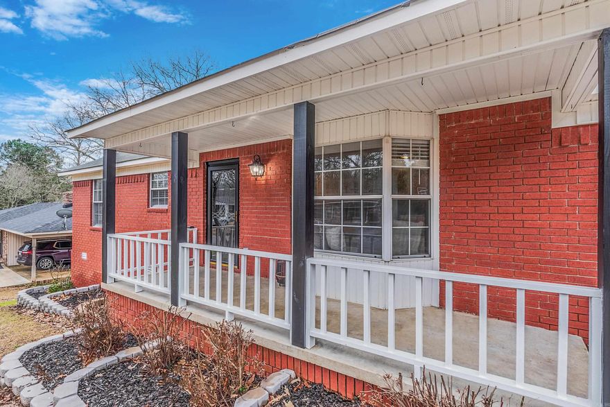 Take a look at this Beautiful 4 bedroom, 2 bath home.  This property has 2000 sq ft.,with an 800 sq ft. building that could be used for any need. New paint, New floors. stainless steel appliance package, Beautiful granite counter tops.  This house has all new lighting and hardware.  Newly stained deck and landscaped flower beds.