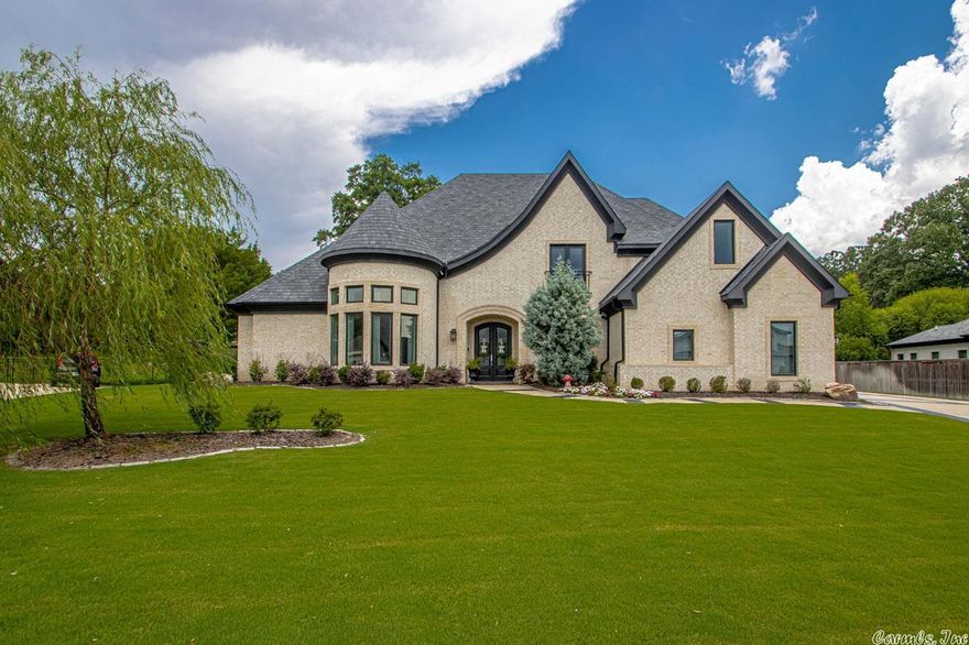 This custom home offers 4 bed/4 1/2 bath with open bonus room in an exclusive subdivision that offer hiking trails and water features.  Amenities include 8' solid wood doors, gourmet kitchen, ss appliances, dual dishwashers, built-in large format fridge, Large master suite, custom shower, custom lighting, custom cabinets, large veranda in back with outdoor kitchen and gas fire pit, large level lot and Gunite  inground salt water pool for entertaining. To many amenities to list. A must see if you're looking for your dream home!