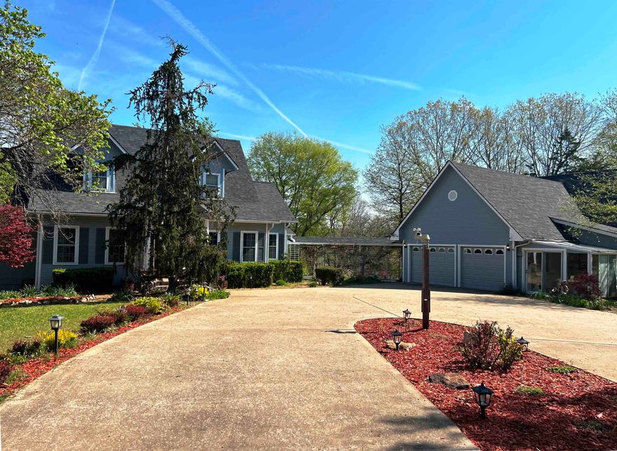 Country estate on the golf course in Cherokee Village, AR! Situated on 2.72 beautifully landscaped acres overlooking the 4th green of the North Golf Course, this spacious home offers luxury, comfort, and room for everyone. Featuring bedrooms on all three levels, including a main-level master suite with heated floors, jetted tub, and custom shower. The home boasts 9 ft ceilings, a formal dining room, and a large kitchen with dinette area. Upstairs includes 2 bedrooms and 1 bath, while the finished basement offers an additional bedroom, bath, game room with gas log fireplace, living area, and office—ideal for multi-generational living or entertaining. Extras include humidfier plumbed into main level HVAC, Lots of buit-ins, buffet in kitchen plumbed for a sink.   Outside, enjoy multiple shops and outbuildings, including a 4-bay shop/garage with ¾ bath, plus an additional shop for storage and a small greenhouse. Relax and take in the scenic golf course views from the backyard, complete with extensive landscaping, a waterfall, and koi pond. A rare opportunity combining space, amenities, and a prime golf course location!