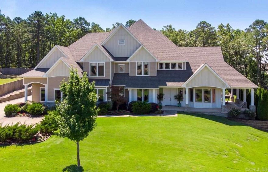 Stunning Chenal Valley Home. The ultimate setting for family living and entertaining friends inside & out! Gorgeous design w/ spectacular floor plan. Inviting entry w/high ceiling. Large living rm and banquet formal dining. Chef's kitchen w/ large island flows into extraordinary great room. Handsome study and guest suite on the main level. Fabulous master suite with terrace, three additional bedrooms and two baths, + large bonus rm & media Up. Fabulous pool, large flat backyard backs to greenblt. 3 car gar.