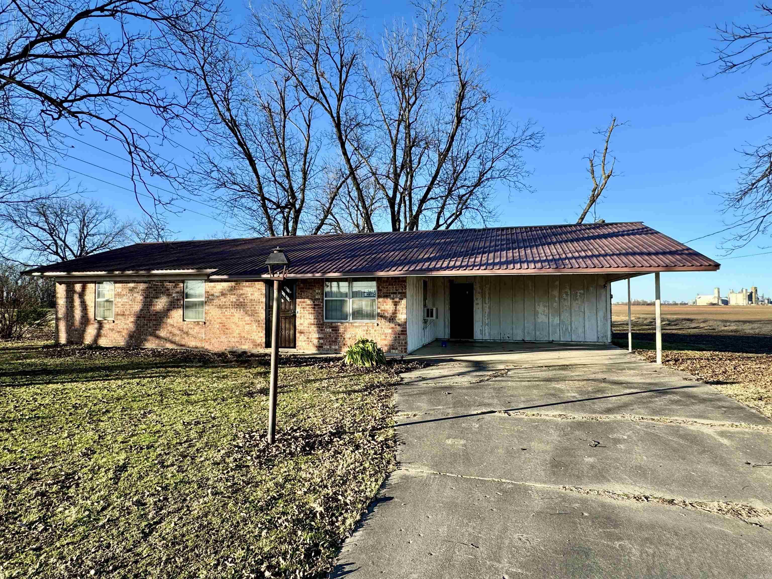 Enjoy natural morning views on this 0.6 acres of Desha County soil. This charming 3-bedroom, 2 bathroom bungalow, perched at the edge of town, offers serene country views. Featuring a durable metal roof and endless potential, it's ready for your personal touch to make it feel like "home" after a busy week in the city. Whether you're a duck hunter, gardening enthusiast, or simply someone who loves outdoor living, this property is the perfect place to unwind and create lasting memories. Don't miss your chance to claim this slice of country paradise.