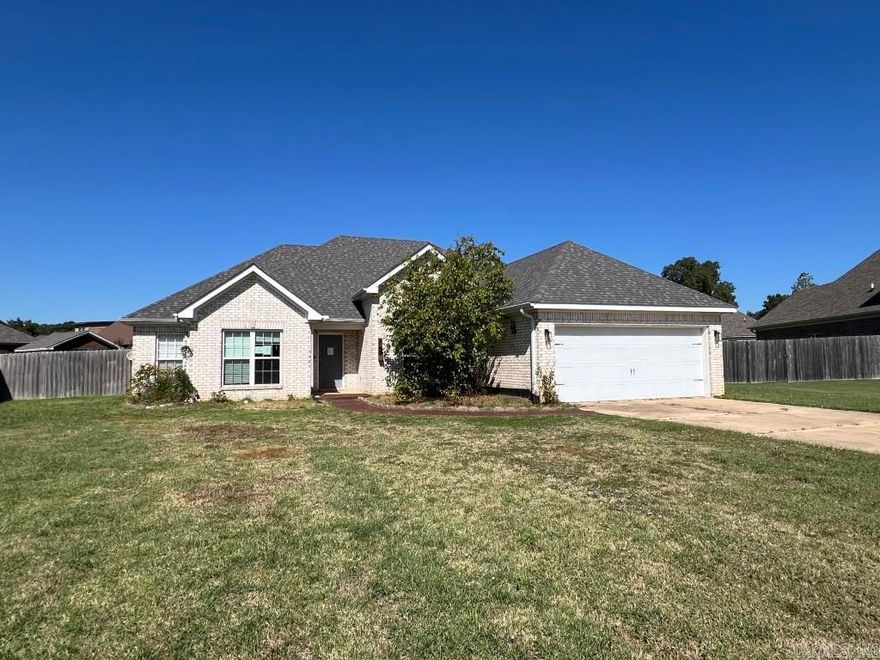 Welcome to this 2,113 sq ft all-brick home nestled on a .42 +/- acre lot in the desirable Bridger Place Subdivision of Nettleton School District. Tucked in a quiet cove, this property features architectural shingles, fenced backyard, and guttering—all setting the stage for true curb appeal. Inside Inside, the spacious living room greets you with tall ceilings, crown molding, rich laminate flooring, and abundant natural light. Just off the entry is a versatile formal dining room or office. The eat-in kitchen is a chef’s delight, offering a cozy morning nook, bar seating, granite countertops, stainless steel appliances, and ample white cabinetry. Step outside to enjoy the covered patio, extended slab for grilling, and the oversized backyard. The primary suite is a true retreat, with space for a sitting area, office, or nursery. The en-suite bath showcases a jet tub, tiled walk-in shower, dual granite vanities, and two walk-in closets. The split floor plan places two additional bedrooms, a full guest bath, and the laundry room on the opposite wing, with direct access to the two-car garage. Agents see additional remarks.