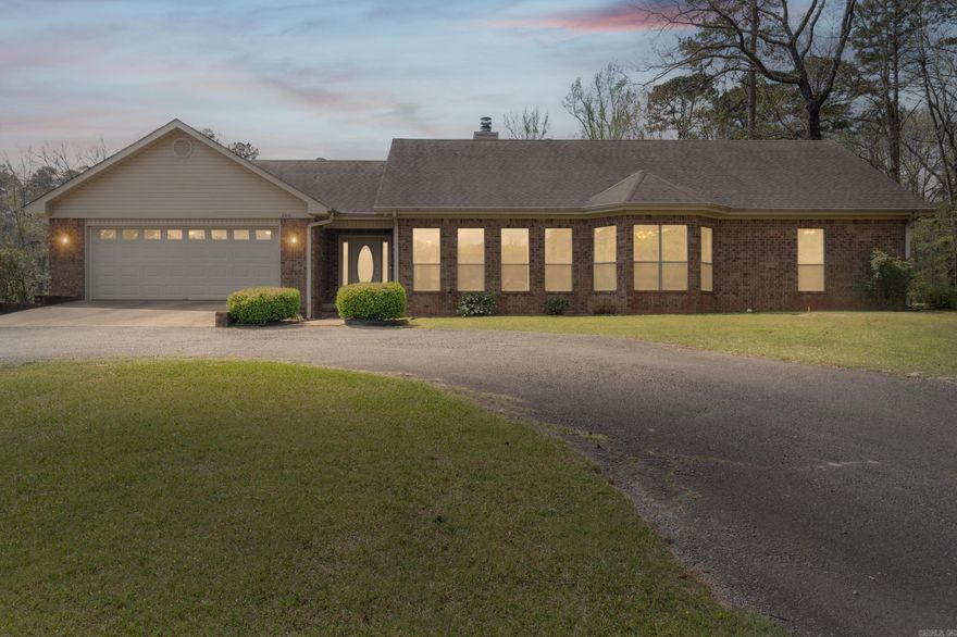 Perfectly positioned on approximately 7 acres, this custom-built home delivers space, privacy, and a layout that’s both functional and well-designed. Offering 3 bedrooms, 2.5 baths, and approximately 2,256 square feet, it blends comfort with thoughtful construction and consistent care.  Inside, you’ll find red oak cabinetry, a dedicated office with built-ins spacious enough for two workstations, and natural light pouring in from front-facing windows. The primary suite includes an ensuite bath and walk-in closet, while the kitchen features matching GE appliances that convey for a seamless, move-in-ready experience.  A true 4-car garage setup, along with a heated and cooled bonus room and built-in storage, provides flexible space for projects, storage, or everyday needs.  The long private driveway creates a strong first impression as you arrive, setting the tone for the space and privacy this property offers. Out back, the large deck overlooks your acreage, creating a standout outdoor space for relaxing or entertaining. A property like this—offering acreage, functionality, and a well-maintained design—isn’t something you see every day.   *Schedule tour today- 2 HOUR NOTICE REQUIRED*