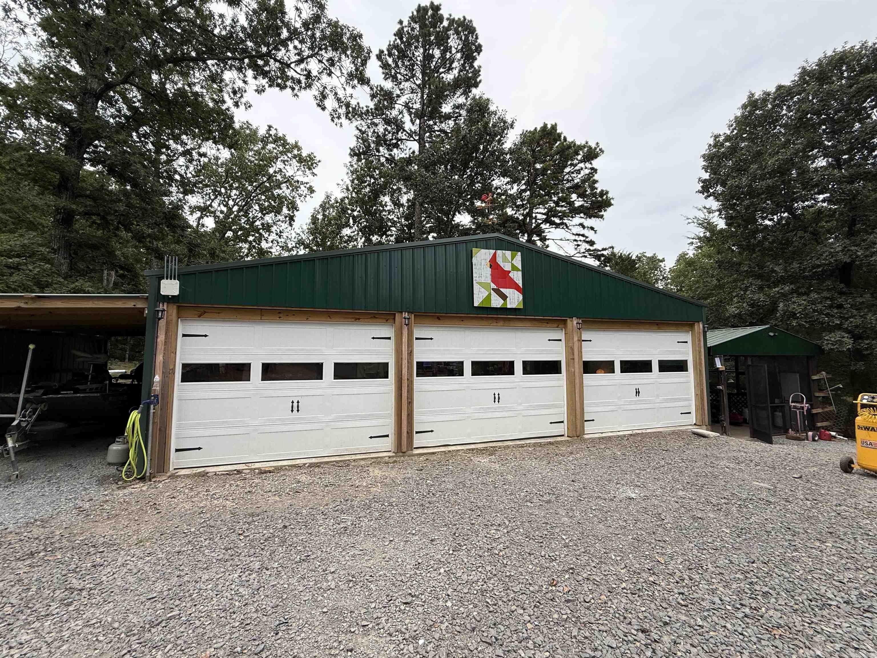 Unrestricted 4.17 Acre, LAKE FRONT property for full time living or perfect Airbnb location. The Home is 2 bed 2 bath, Large 3 bay heated and cooled shop (1,140 sq ft) with 1 bed and 1 bath. Property has RV hookup (30 and 50 amp plug) Seasonal wet weather creek and cleared path down to the lake for easy access.