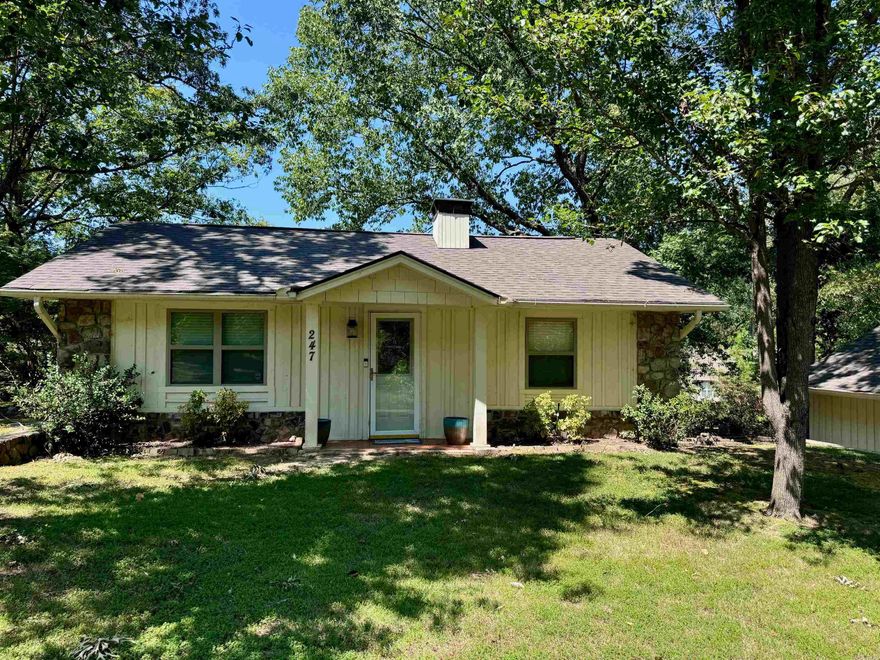 Come see this fully-furnished Lake Hamilton home that has something for everyone. With so much to offer, this 3/2.5 home stands out from everything in its price range. Find your dream lake home inside with two spacious living areas to relax or entertain, plus plenty of sleeping room for all. Outside is made for relaxation with mature landscaping and shady trees that provide a perfect place for outdoor enjoyment. You'll love the many decks, balconies and the beautiful gazebo near the water to soak up the sunset views. Waterfront also features a sitting deck over the water and a two stall boat dock with a lift.  Whether you're entertaining friends, relaxing in solitude, or investing in a vacation home, you'll find everything you need to create the ultimate lakeside retreat. Nightly rentals allowed.