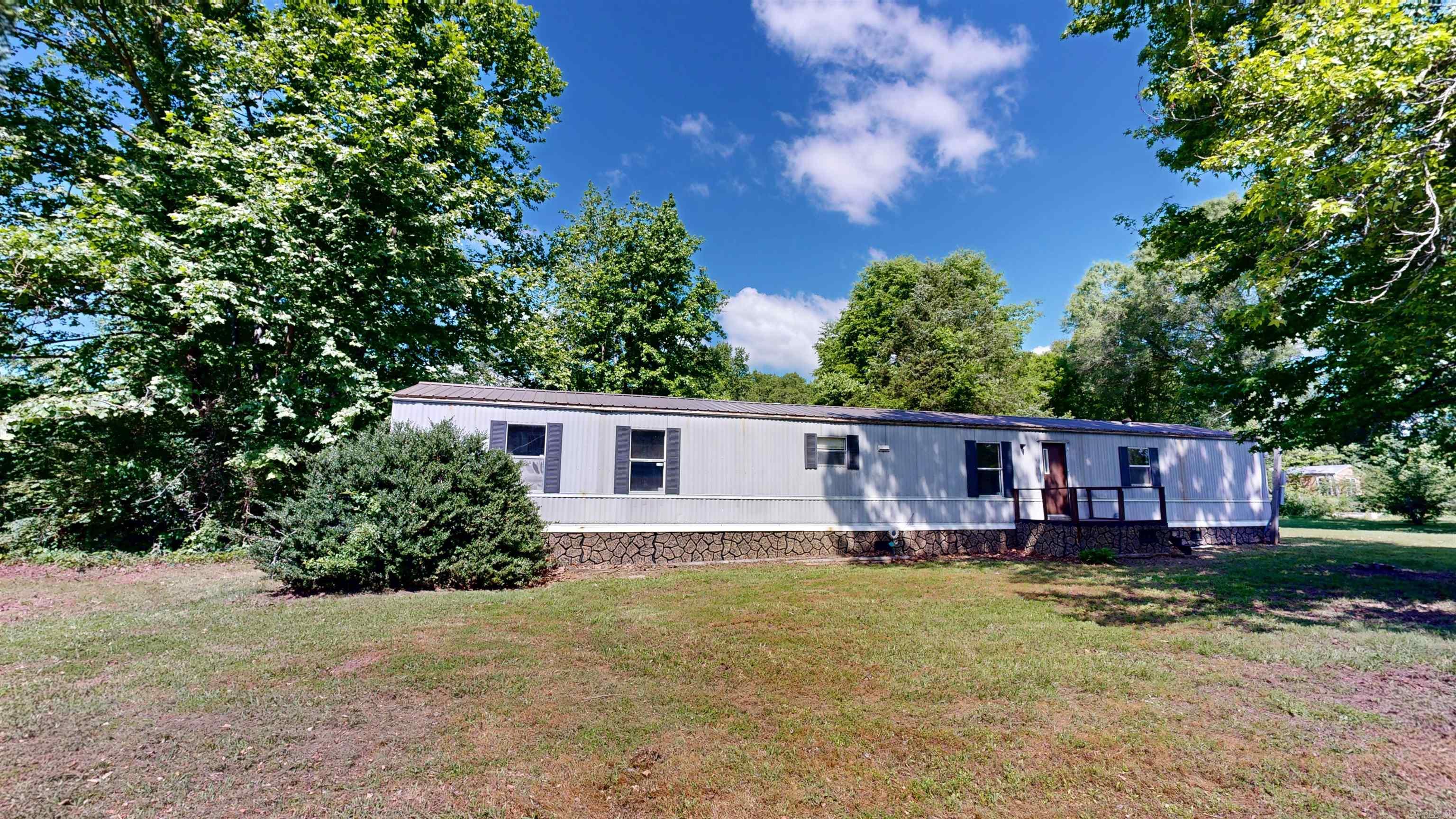 This charming 1994 singlewide mobile home sits on a spacious and level 0.84-acre corner lot, offering plenty of room to enjoy the outdoors, plant a garden, or even build a shop. The lot features mature trees that provide shade and privacy while still allowing for open space. Inside, youāll find brand-new luxury vinyl plank (LVP) flooring throughout, combining durability with modern style. A new roof and new water heater have also been recently installed. Whether you're looking to purchase your first home or invest in a rental property, this one checks the boxes. The home is move-in ready and located in an award-winning school district. With its convenient location and comfortable layout, this property offers both comfort and potential. Come see what makes this property a standout option in todayās market!