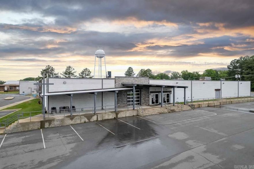 This commercial property is a versatile space that can accommodate a variety of uses. It features a church with ample seating, a warehouse for storage, a school that can be used for  classrooms or offices, and a commercial kitchen that is perfect for catering or food service and it even has its own coffee shop! With its multiple amenities this property is perfect for  organizations looking for a flexible and functional space. The location is centrally located in the heart of Cabot with traffic counts averaging about 12,000 cars per day. Your audience will have a front row seat to your business. You are also located within minutes of 67/167 making it easy for out of towners to find your location. Zone C-2. Local population 27,147 as of 2020. Agents see remarks.