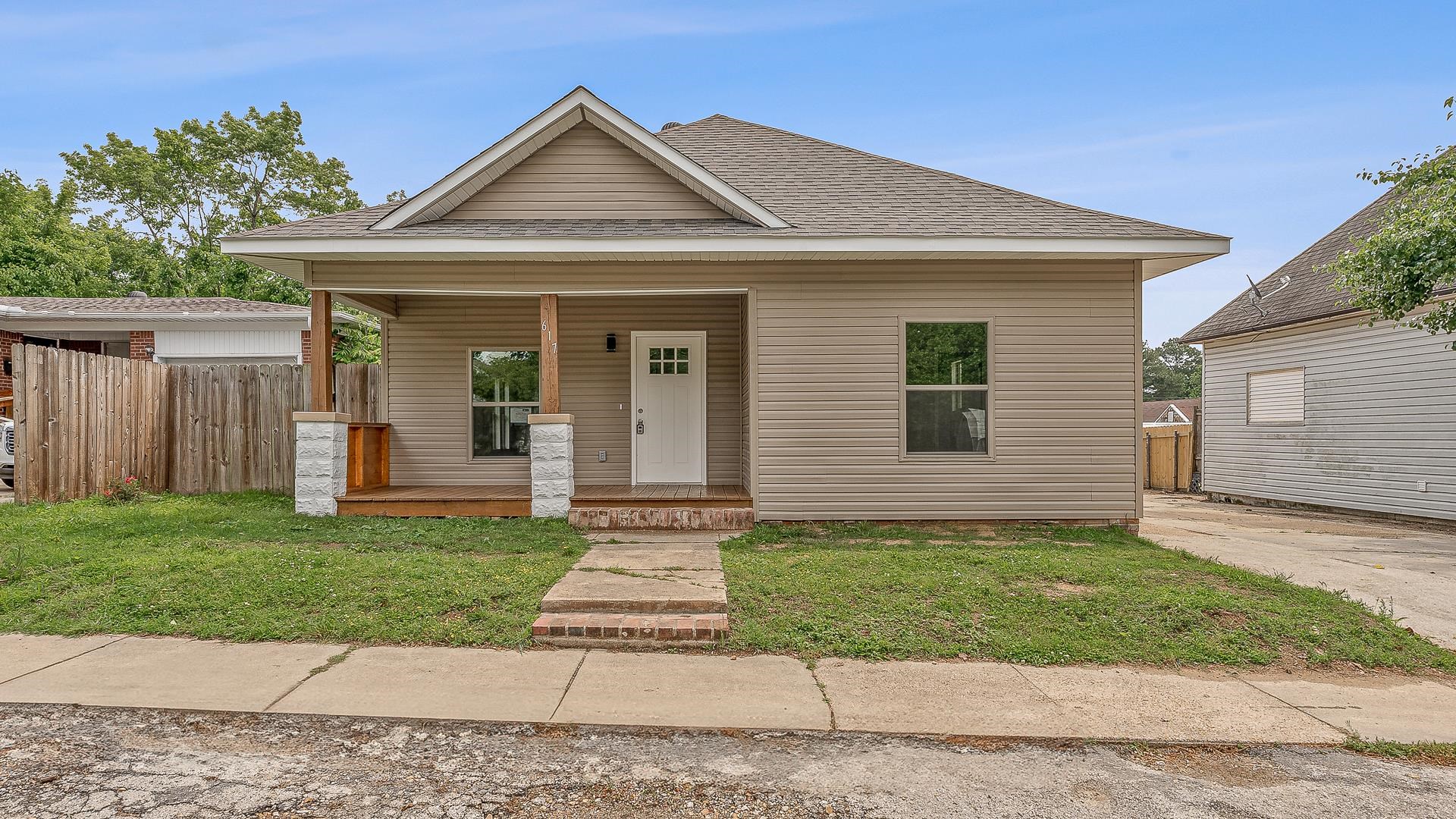 Welcome home to a perfect blend of classic charm with stylish updates! This 3-bedroom, 2-bath beauty has been completely remodeled and is packed with personality—from the inviting front porch to the private backyard retreat. Step inside and fall in love with the all-new granite kitchen featuring sleek stainless appliances and plenty of space to channel your inner chef. Luxury vinyl plank flooring flows throughout, giving the home a fresh, modern feel while still being oh-so-easy to maintain. Need space for a hobby or side hustle? You’ll swoon over the detached 20x25 workshop—a dream for DIYers, creatives, or weekend tinkerers. Plus, there’s a separate single-car garage for extra storage or your favorite vintage ride. Out back, relax on the wood deck, or side patio for a bistro table or entertain in the private yard—perfect for morning coffee or summer BBQs. And yes, all this within city limits! This home checks all the boxes: charm, convenience, and room to play. Don’t miss your chance to own a home that feels as good as it looks! ????