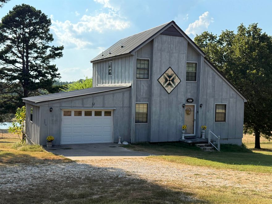 Check out this charming 3-bedroom, 2-bath home with a country setting just minutes from food and shopping. The thoughtful design includes a Jack-and-Jill bedroom/bath combo upstairs, making it ideal for family or guests. A focal point of this home is the large screened-in porch located at the back of the house, which invites you to unwind and overlook a beautiful pond, perfect for sipping morning coffee or chatting at evening gatherings. On each side of this area are open decks providing sunny spots for relaxing, BBQing, or enteraining. Directly below and just off the basement walkout, you will find a cozy sitting area with a swing offering a quiet retreat to enjoy your favorite book. With a garage for convenience and a partial basement for extra space and safety, this home blends comfort, charm, and character in all the right places. Come take a look for yourself.