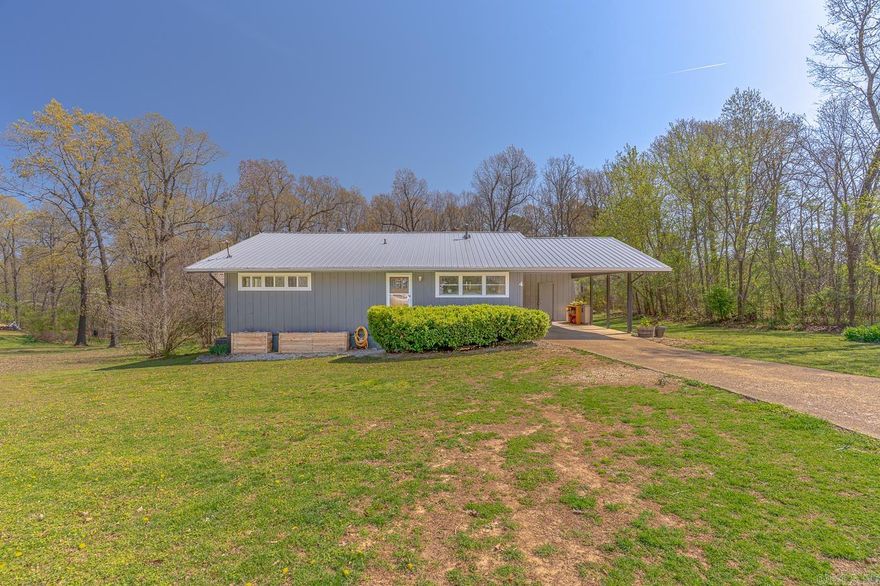 Welcome to Market 4 Miccosukee Drive, Cherokee Village, AR. This beautiful  Tri-Level 3 br/2 ba 1520 sq ft home on .38 acre has recently been remodeled. The entry hall leads to the master bedroom, bathroom and 2nd bedroom. The upper level features an open floor plan with living room and dining/kitchen, complete with new stainless appliances and sink. French doors lead out to a 32' wood deck overlooking a spacious backyard with no immediate neighbors. The lower level walkout basement includes a 2nd bathroom, 3rd bedroom, large bonus room/4th bedroom and a laundry room. Recent improvements include a new metal roof with 40 yr warranty, all new double paned windows & doors, electric HVAC system, propane wall heater, water softener, as well as new lighting and water fixtures. Conveniently located near local amenities such as 7 lakes, 2 golf courses, swimming pool, beaches, walking trails, waterfalls, parks, restaurants, shopping, schools and medical facilities. This home is 2 min from the Cherokee Village entrance and the town of Highland. Come explore the nearby unique Old Hardy Town and take a Spring River canoe trip. Call for your appointment today to make this house YOUR NEW HOME!